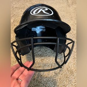 Rawlings black batting helmet with face shield